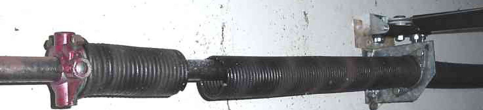 Broken garage door torsion spring causing malfunction on La Palma, CA home garage
